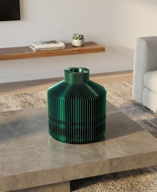 Vaso LUMA Basso bicolore verde e nero stampato in 3D su tavolino in cemento